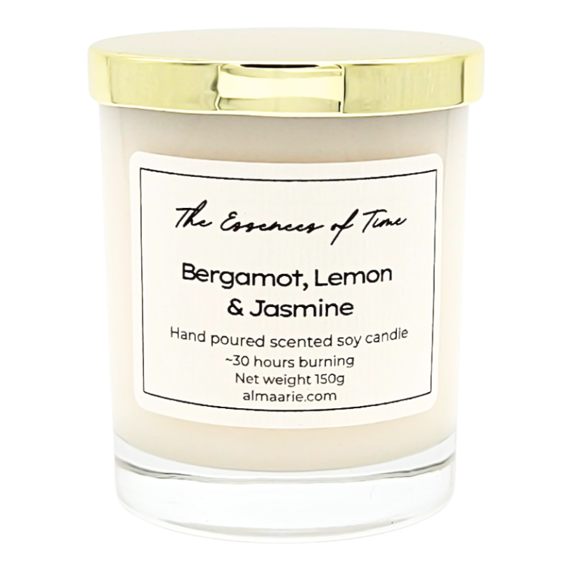 Bergamot, Lemon and Jasmine scented soya candle in a clear glass container with gold lid.