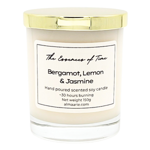 Bergamot, Lemon and Jasmine scented soya candle in a clear glass container with gold lid.